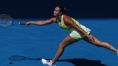Belarus' Aryna Sabalenka hits a return against Denmark's Clara Tauson during their women's singles match on day six of the Australian Open tennis tournament in Melbourne. (Photo by Adrian DENNIS / AFP) (AFP) Belarus' Aryna Sabalenka hits a return against Denmark's Clara Tauson during their women's singles match on day six of the Australian Open tennis tournament in Melbourne. (Photo by Adrian DENNIS / AFP) (AFP)