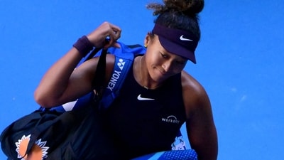 Two-time Australian Open champion Naomi Osaka said "it sucks" after retiring Friday with a stomach muscle injury during her third-round match. (Photo by Yuichi YAMAZAKI / AFP) / (AFP) Two-time Australian Open champion Naomi Osaka said "it sucks" after retiring Friday with a stomach muscle injury during her third-round match. (Photo by Yuichi YAMAZAKI / AFP) / (AFP)
