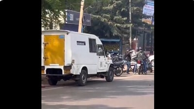 The robbers fled the spot in a bike, carrying the cash filled trunk. (X) The robbers fled the spot in a bike, carrying the cash filled trunk. (X)