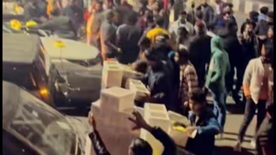 Around 50 four-wheelers were parked in a queue on a busy road as hundreds gathered to mark the birthday of Raghvendra Pratap Singh. (Sourced)