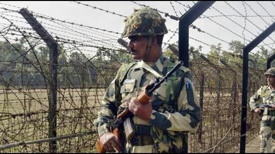 Border Security Force personnel patrol along the India-Bangladesh border fence (PTI FILE/Representative Image)