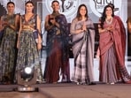 Designer Aditi Jaggi Rastogi with showstopper Ritu Suhas, a bureaucrat, and other models
