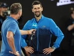 Serbia's Novak Djokovic speaks with a presenter. Serbia's Novak Djokovic speaks with a presenter.