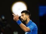 Serbia's Novak Djokovic gestures as he celebrates winning his third round match.