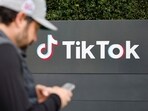TikToker and "newsfluencer" Joe Andaloro, who goes by the TikTok handle @joy.of.everything, films a TikTok video outside the U.S. headquarters of the social media company TikTok in Culver City, California, U.S. January 18, 2025.    (REUTERS)