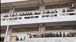 Lawyers and others watch Sanjay Roy being brought to the Sealdah court in Kolkata on Saturday. (PTI)