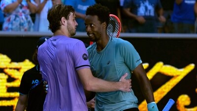 Gael Monfils, right, of France is congratulated by Taylor Fritz of the U.S. following their third round match at the Australian Open. (AP)