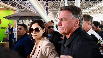 Former Brazilian President Jair Bolsonaro accompanies his wife, Michelle Bolsonaro who will be attending Trump's inauguration (AFP) Former Brazilian President Jair Bolsonaro accompanies his wife, Michelle Bolsonaro who will be attending Trump's inauguration (AFP)