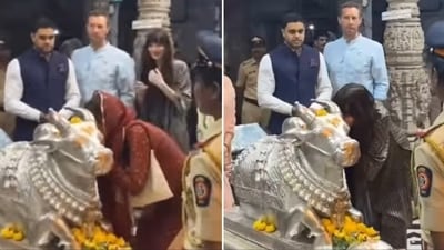 Dakota Johnson and Chris Martin inside Mumbai's Shri Babulnath Temple. Dakota Johnson and Chris Martin inside Mumbai's Shri Babulnath Temple.