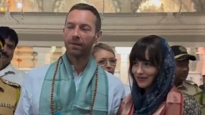 Chris Martin and Dakota Johnson at visited the iconic Shri Babulnath Temple on Friday (Pic- coldplayindia._in) Chris Martin and Dakota Johnson at visited the iconic Shri Babulnath Temple on Friday (Pic- coldplayindia._in)