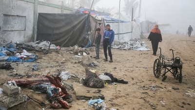 Palestinian president Mahmud Abbas said the Palestinian Authority has completed preparations "to assume full responsibility in Gaza" after the war. In pic: Palestinian boys stand near a damaged tent for displaced people, after an Israeli airstrike, amid the conflict between Israel and Hamas, in Khan Younis, southern Gaza Strip, January 17, 2025.&nbsp; (REUTERS)