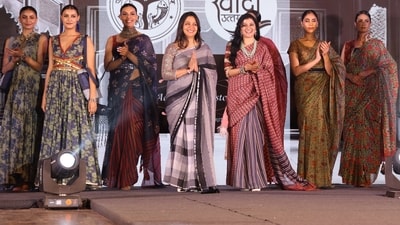 Designer Aditi Jaggi Rastogi with showstopper Ritu Suhas, a bureaucrat, and other models (Photo: Mushtak Khan) Designer Aditi Jaggi Rastogi with showstopper Ritu Suhas, a bureaucrat, and other models (Photo: Mushtak Khan)
