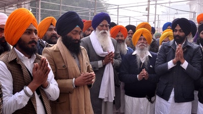 Khadoor Sahib MP Amritpal Singh’s father Tarsem Singh (extreme left) with other leaders of the Akali Dal (Waris Punjab De) party at the Golden Temple on Saturday. (Sameer Sehgal/HT) Khadoor Sahib MP Amritpal Singh’s father Tarsem Singh (extreme left) with other leaders of the Akali Dal (Waris Punjab De) party at the Golden Temple on Saturday. (Sameer Sehgal/HT)