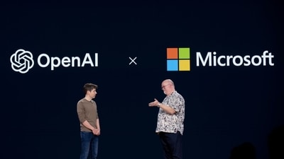 Kevin Scott, executive vice president of AI and chief technology officer of Microsoft Corp., right, and Sam Altman, chief executive officer of OpenAI, at the Microsoft Build event in Seattle, Photographer: Chona Kasinger/Bloomberg (Bloomberg)