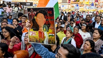 Social activists shout slogans near the Sealdah Civil and Criminal Court in Kolkata on January 18, 2025. (AFP) Social activists shout slogans near the Sealdah Civil and Criminal Court in Kolkata on January 18, 2025. (AFP)