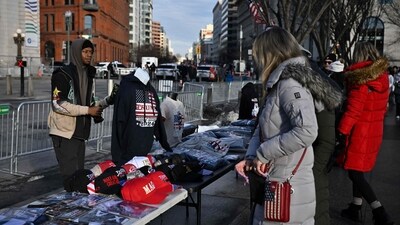 People look at Trump merchandise near the White House in Washington, DC as the US capital prepares for the inauguration of US President-elect Donald Trump. (AFP) People look at Trump merchandise near the White House in Washington, DC as the US capital prepares for the inauguration of US President-elect Donald Trump. (AFP)