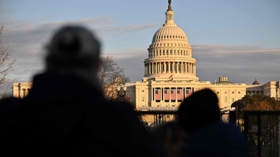 People look at the US Capitol in Washington as the US capital prepares for the inauguration of US President-elect Donald Trump. (AFP) People look at the US Capitol in Washington as the US capital prepares for the inauguration of US President-elect Donald Trump. (AFP)