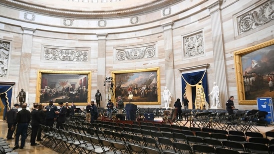 The US Capitol Rotunda is prepared for the inauguration of US President-elect Donald Trump in Washington, DC. Trump said that his inauguration as US president on January 20 will be moved indoors due to expected freezing weather. Trump said he will deliver his inaugural address in the Rotunda of the US Capitol. (Photo by SAUL LOEB / AFP)(AFP)