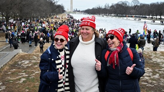 Supporters of US President-elect Donald Trump pose for a photo near the Lincoln Memorial, ahead of Trump's presidential inauguration, in Washington.(REUTERS)