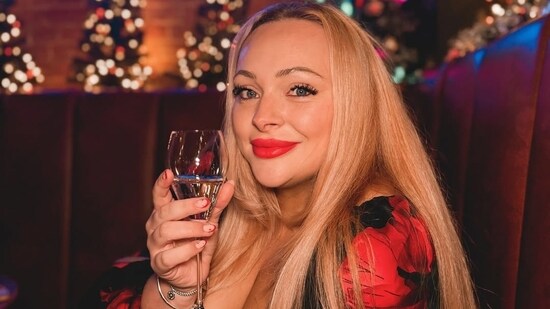 A UK influencer sparked controversy by sharing her "woman tax" arrangement, where her husband paid her for personal expenses to compensate for motherhood challenges. (Instagram/camilla.and.family)