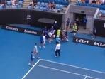 A ball kid fainted during a mixed doubles match in Melbourne. A ball kid fainted during a mixed doubles match in Melbourne.