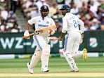 India's batsman Rishabh Pant (L) and teammate Ravindra Jadeja (R) take a single on the third day of the fourth cricket Test match between Australia and India at the Melbourne Cricket Ground India's batsman Rishabh Pant (L) and teammate Ravindra Jadeja (R) take a single on the third day of the fourth cricket Test match between Australia and India at the Melbourne Cricket Ground