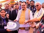 FILE: Rajasthan Chief Minister Bhajanlal Sharma, center, state Education Minister Madan Dilawar and others felicitate a young woman during an employment exhibition on completion of one year of the state government. FILE: Rajasthan Chief Minister Bhajanlal Sharma, center, state Education Minister Madan Dilawar and others felicitate a young woman during an employment exhibition on completion of one year of the state government.