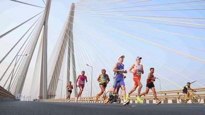Participants run in the Tata Mumbai Half Marathon 2025, at Bandra-Worli Sea Link in Mumbai on Sunday. (ANI Photo) Participants run in the Tata Mumbai Half Marathon 2025, at Bandra-Worli Sea Link in Mumbai on Sunday. (ANI Photo)
