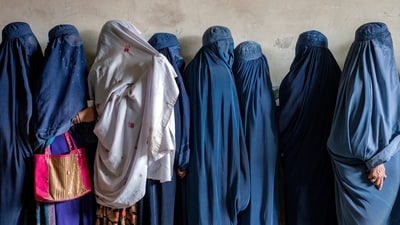 A top Taliban commander has called on the group's leader to lift the prohibition on Afghan women and girls attending school, stating that there is no justification for it. (AP/Ebrahim Noroozi)