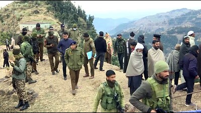 Army personnel in Badhaal village of Rajouri district on Sunday. (ANI) Army personnel in Badhaal village of Rajouri district on Sunday. (ANI)