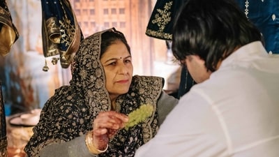 Neeraj also posted a photo of his mother, who is seen performing rituals during one of the wedding ceremonies. (X/@Neeraj_chopra1) Neeraj also posted a photo of his mother, who is seen performing rituals during one of the wedding ceremonies. (X/@Neeraj_chopra1)