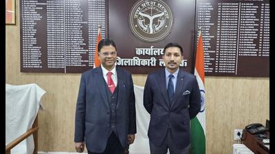New Lucknow DM Vishak G (right) with his predecessor Surya Pal Gangwar while assuming office on Jan 19. (Sourced) New Lucknow DM Vishak G (right) with his predecessor Surya Pal Gangwar while assuming office on Jan 19. (Sourced)