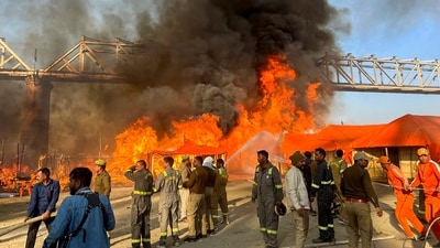 Huge flames of fire as seen in a camp in the Mahakumbh tent city in Sangam, Prayagraj on Sunday. Members of the National Disaster Response Force (NDRF) personnel are also present on the site. (PTI) Huge flames of fire as seen in a camp in the Mahakumbh tent city in Sangam, Prayagraj on Sunday. Members of the National Disaster Response Force (NDRF) personnel are also present on the site. (PTI)