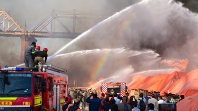 Firefighters try to douse a fire that broke out in tents during Mahakumbh, at Sangam in Prayagraj on Sunday. The authorities rose quickly to action in trying to bring the fire under control (PTI) Firefighters try to douse a fire that broke out in tents during Mahakumbh, at Sangam in Prayagraj on Sunday. The authorities rose quickly to action in trying to bring the fire under control (PTI)