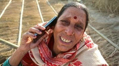 A devotee talks on a mobile phone after a fire broke out in tents during Mahakumbh, at Sangam in Prayagraj on Sunday.Prayagraj district magistrate Ravindra Kumar told ANI that the fire broke out at 4.30pm in sector 19 in the tent of Gita press. There is no information of any casualty. The situation is under control," (PTI) A devotee talks on a mobile phone after a fire broke out in tents during Mahakumbh, at Sangam in Prayagraj on Sunday.Prayagraj district magistrate Ravindra Kumar told ANI that the fire broke out at 4.30pm in sector 19 in the tent of Gita press. There is no information of any casualty. The situation is under control," (PTI)