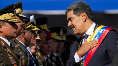 Venezuelan President Nicolas Maduro talks to high-ranking officers during a military ceremony on his inauguration day for a third term in Caracas, Venezuela, Jan. 10, 2025. (AP Photo/Ariana Cubillos) (AP) Venezuelan President Nicolas Maduro talks to high-ranking officers during a military ceremony on his inauguration day for a third term in Caracas, Venezuela, Jan. 10, 2025. (AP Photo/Ariana Cubillos) (AP)
