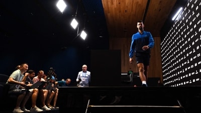 Novak Djokovic leaves after a press conference at the Australian Open. (AFP) Novak Djokovic leaves after a press conference at the Australian Open. (AFP)
