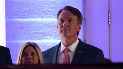STERLING, VIRGINIA - JANUARY 18: Virginia Gov. Glenn Youngkin and his wife Suzanne watch a fireworks show for U.S. President-elect Donald Trump at Trump National Golf Club on January 18, 2025 in Sterling, Virginia. Trump has arrived in the Washington, DC region ahead of his inauguration ceremony on January 20 which has been moved inside the U.S. Capitol as temperatures are expected to be the coldest in forty years. Andrew Harnik/Getty Images/AFP (Photo by Andrew Harnik / GETTY IMAGES NORTH AMERICA / Getty Images via AFP) (Getty Images via AFP) STERLING, VIRGINIA - JANUARY 18: Virginia Gov. Glenn Youngkin and his wife Suzanne watch a fireworks show for U.S. President-elect Donald Trump at Trump National Golf Club on January 18, 2025 in Sterling, Virginia. Trump has arrived in the Washington, DC region ahead of his inauguration ceremony on January 20 which has been moved inside the U.S. Capitol as temperatures are expected to be the coldest in forty years. Andrew Harnik/Getty Images/AFP (Photo by Andrew Harnik / GETTY IMAGES NORTH AMERICA / Getty Images via AFP) (Getty Images via AFP)