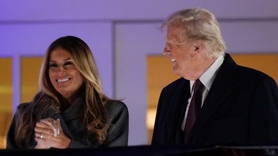 STERLING, VIRGINIA - JANUARY 18: U.S. President-elect Donald Trump and his wife Melania Trump enjoy a fireworks show at Trump National Golf Club on January 18, 2025 in Sterling, Virginia. The two appeared in uplifted spirits as they enjoyed the beautiful sights of fireworks ahead of the inauguration ceremony. Andrew Harnik/Getty Images/AFP (Photo by Andrew Harnik / GETTY IMAGES NORTH AMERICA / Getty Images via AFP) (Getty Images via AFP) STERLING, VIRGINIA - JANUARY 18: U.S. President-elect Donald Trump and his wife Melania Trump enjoy a fireworks show at Trump National Golf Club on January 18, 2025 in Sterling, Virginia. The two appeared in uplifted spirits as they enjoyed the beautiful sights of fireworks ahead of the inauguration ceremony. Andrew Harnik/Getty Images/AFP (Photo by Andrew Harnik / GETTY IMAGES NORTH AMERICA / Getty Images via AFP) (Getty Images via AFP)