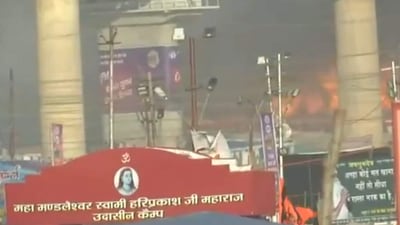 The fire seen inside the Swami Hariprakash Camp in Sector 19 of the tent city in Prayagraj. (HT Photo) The fire seen inside the Swami Hariprakash Camp in Sector 19 of the tent city in Prayagraj. (HT Photo)