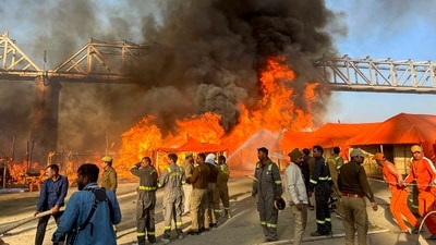 Mahakumbh fire: Smoke billows out after a fire broke out in a camp during Mahakumbh in Prayagraj on January 19. (PTI)