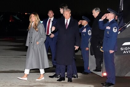 President-elect Donald Trump and Melania Trump, walk off an Air Force Special Mission airplane as they arrive at Dulles International Airport, Saturday, Jan. 18, 2025, in Dulles, Va. (AP Photo/Alex Brandon) (AP) President-elect Donald Trump and Melania Trump, walk off an Air Force Special Mission airplane as they arrive at Dulles International Airport, Saturday, Jan. 18, 2025, in Dulles, Va. (AP Photo/Alex Brandon) (AP)