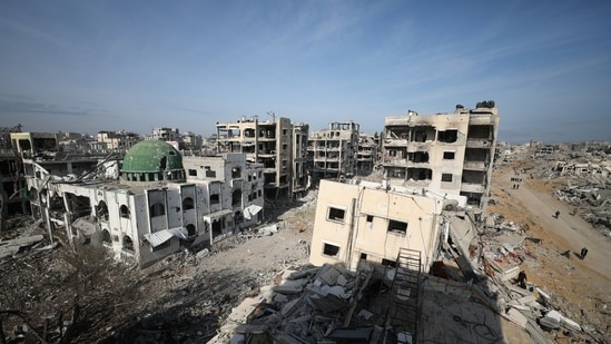 Displaced Palestinians walk past the rubble as they attempt to return to their homes, following a delay in the ceasefire between Israel and Hamas over the hostage list, in the northern Gaza Strip, January 19, 2025.&nbsp;(REUTERS)