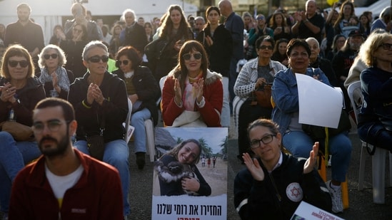 People gather at a square to watch broadcasts related to the expected release of three female hostages who have been held in Gaza since the deadly October 7, 2023 attack, amid a ceasefire deal between Hamas and Israel, in Tel Aviv, Israel, January 19, 2025. (REUTERS/Shir Torem)