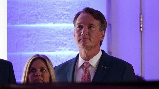 STERLING, VIRGINIA - JANUARY 18: Virginia Gov. Glenn Youngkin and his wife Suzanne watch a fireworks show for U.S. President-elect Donald Trump at Trump National Golf Club on January 18, 2025 in Sterling, Virginia. Trump has arrived in the Washington, DC region ahead of his inauguration ceremony on January 20 which has been moved inside the U.S. Capitol as temperatures are expected to be the coldest in forty years. Andrew Harnik/Getty Images/AFP (Photo by Andrew Harnik / GETTY IMAGES NORTH AMERICA / Getty Images via AFP)(Getty Images via AFP)