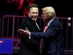 U.S. President-elect Donald Trump greets Tesla CEO and X owner Elon Musk during a rally the day before Trump is scheduled to be inaugurated for a second term, in Washington, U.S., January 19, 2025.