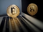 A bitcoin is seen in an illustration picture taken at La Maison du Bitcoin in Paris, France, June 23, 2017.