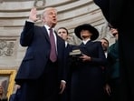Donald Trump is sworn in as the 47th president of the United States by Chief Justice John Roberts as Melania Trump holds the Bible.