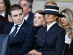 Barron Trump and First Lady Melania Trump listen as US President Donald Trump delivers remarks after being sworn in as the 47th President.