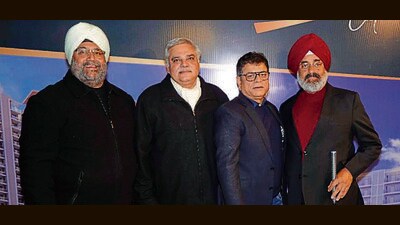 (From left) Chandigarh Golf Club president Ravi Bir Singh, captain Rohit Singh Dagar, Rajiv Gupta MD -Wave Estate and Kulwaran Singh the gross winner of the medal round. (HT photo)